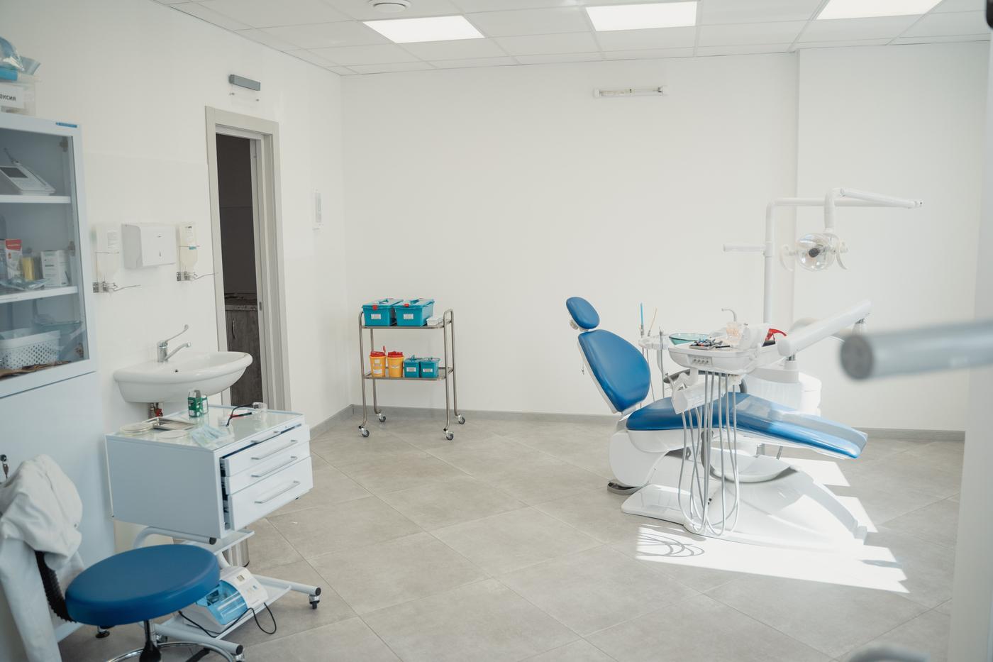 Inside Maplewood Dental — a bright, modern treatment room with blue dental chair