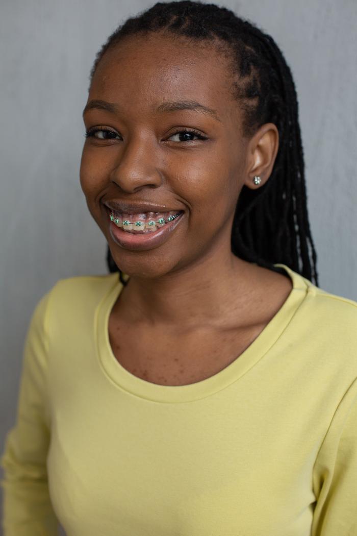 Young patient smiling confidently with braces