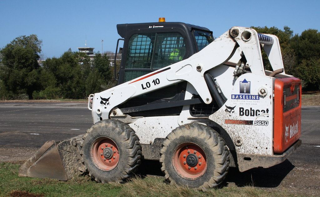 A Bobcat skid-steer loader ready for heavy yard work